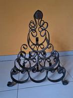 un porte-bouteilles en fer forgé, Enlèvement