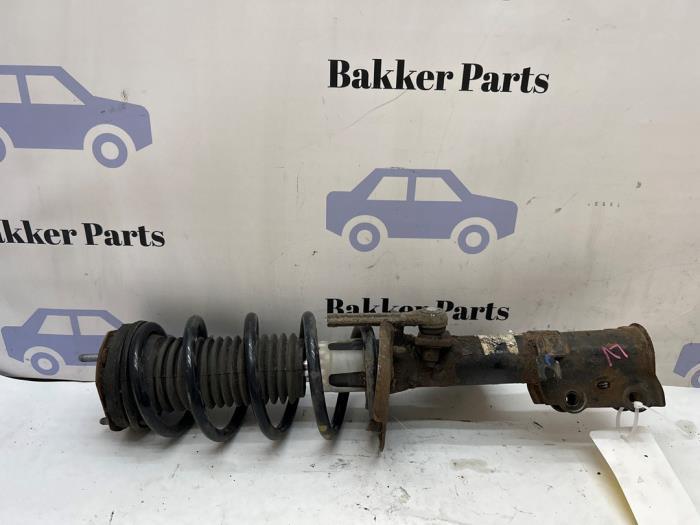 Schokdemper links-voor van een Ford Fiesta, Auto-onderdelen, Ophanging en Onderstel, Ford, Gebruikt, 3 maanden garantie