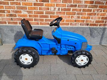 Blauwe kindertractor beschikbaar voor biedingen