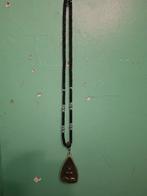 Thaise amulet, Ophalen