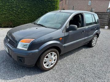 Ford Fusion 2010 1.4i Benzine airco  achter schade beschikbaar voor biedingen
