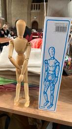 Houten figuurtje, Enlèvement ou Envoi