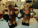 2 houten biggetjes, Ophalen