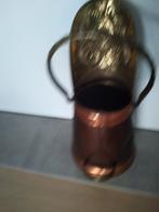 Koperen kolen bak kan ook dienst doen als paraplu bak, Ophalen