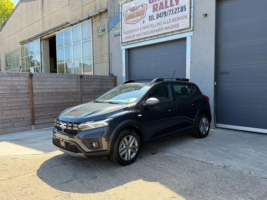 Dacia Sandero Stepway Expression (bj 2023), Auto's, Stof, Gebruikt, 67 kW, 127 g/km