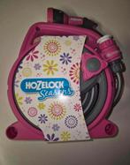 New tuinslang op rol, Ophalen