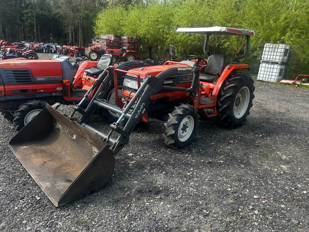 Kubota GL321 (32pk) met voorlader, Enlèvement