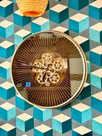 Industriële klok met bewegende tandwielen, Ophalen