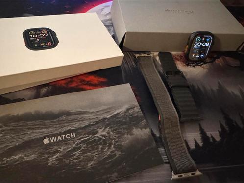 Apple Watch Ultra 2 (2024) - 49 mm - Met 2 banden & bescherm, Handtassen en Accessoires, Smartwatches, Zo goed als nieuw, Oranje