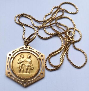 18k gouden tweeling met 18k ketting  beschikbaar voor biedingen