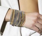 Sarah Pacini 50 delige gouden en zilveren armband nieuw, Ophalen of Verzenden, Nieuw, Overige kleuren, Elastiek