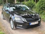 Octavia Combi 1.5 TSI ACT DSG met afneembare trekhaak, Auto's, Skoda, Stof, 139 g/km, 4 cilinders, Zwart