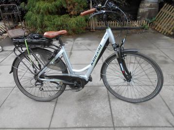 Te koop elektrische damesfiets KRIGOR middenmoter BAFANG beschikbaar voor biedingen