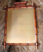 Verweerde spiegel in faux bamboo kader, Enlèvement