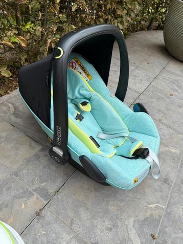 Mintgroene maxi cosy beschikbaar voor biedingen