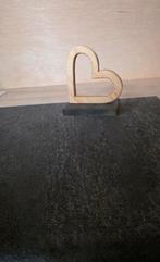 Zelfgemaakt houten hartje, Ophalen