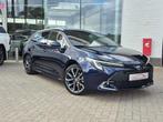 Toyota Corolla TS 1.8 Hybrid Premium 140pk FACELIFT +Trekhaa, Auto's, 1300 kg, Gebruikt, 4 cilinders, Blauw