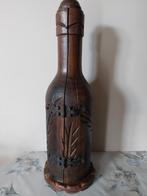 houten fles, Enlèvement