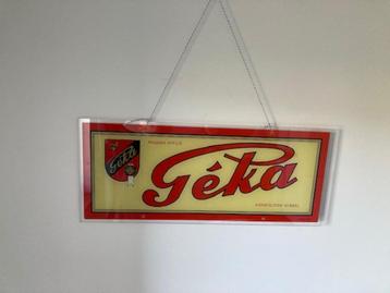 Glasgeschilderd reklamepaneel  "Géka" beschikbaar voor biedingen