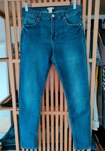 Slim fit jeans met hoge taille maat 40. H&M. 1 x gedragen. I disponible aux enchères