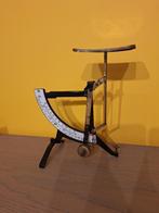 Briefweegschaal, Ophalen