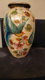 Een grote vaas, Ophalen