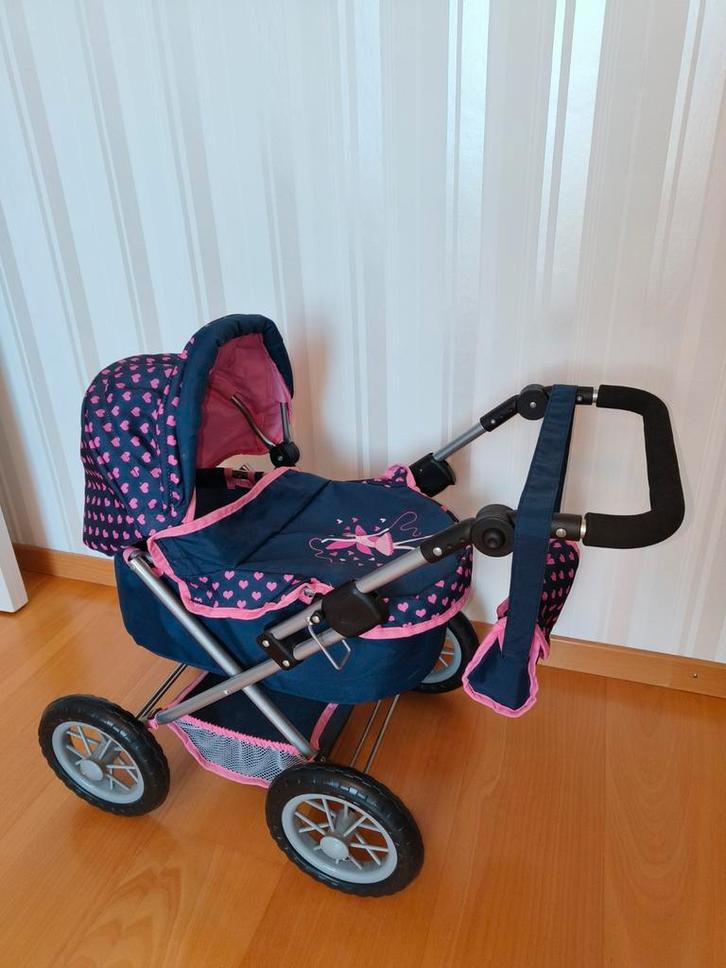 poppenwagen met roze hartjes van Bayer in goede staat, Kinderen en Baby's, Speelgoed | Poppen, Ophalen of Verzenden