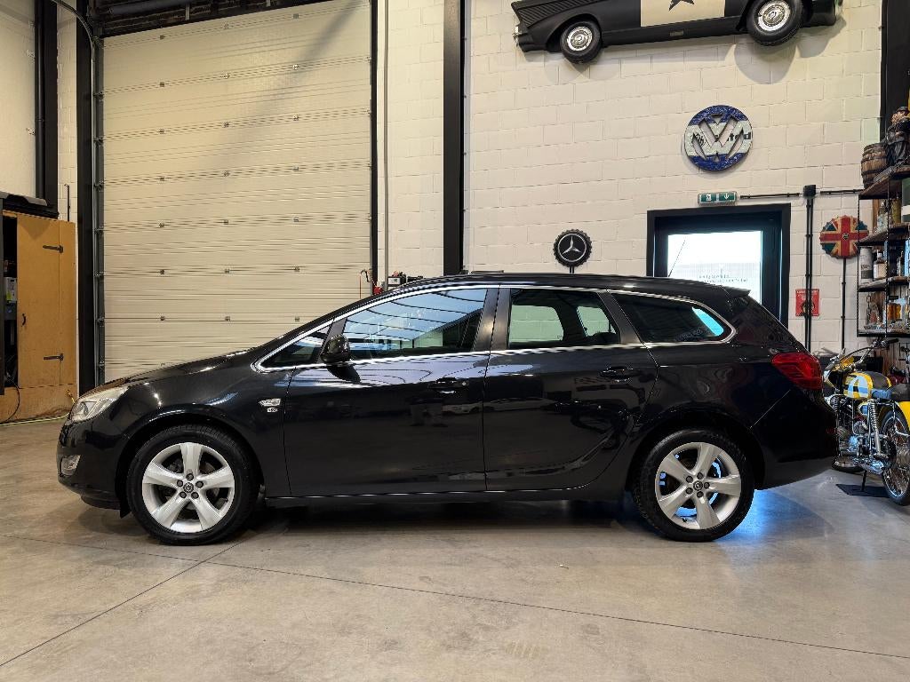 opel astra sports tourer 1400cc benzine - topstaat -, Auto's, Voorwielaandrijving, Euro 5, 4 cilinders, Leder en Stof