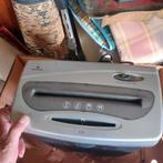 Papier versnipper, Ophalen