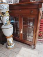 Vitrine kast, Ophalen