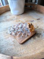 Swarovski kristal, Ophalen