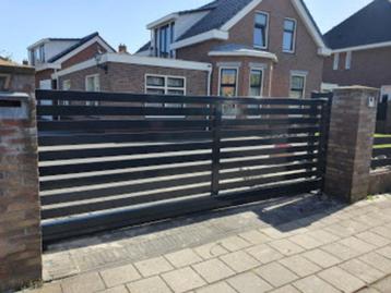 LAmellen schuifpoort 4x1,2 incl fundatie,motor en montage beschikbaar voor biedingen