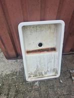 oude stenen uitgietbak, Ophalen