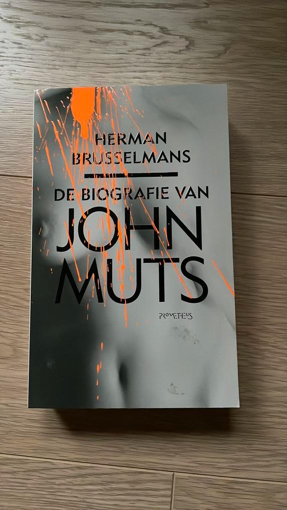 Herman Brusselmans - Biografie van John Muts, Boeken, Literatuur, Nieuw, België, Ophalen of Verzenden