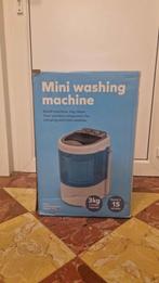 Mini Wasmachine, Ophalen