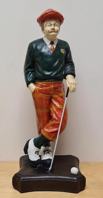 Golfspeler (in beschilderd plaaster) beschikbaar voor biedingen