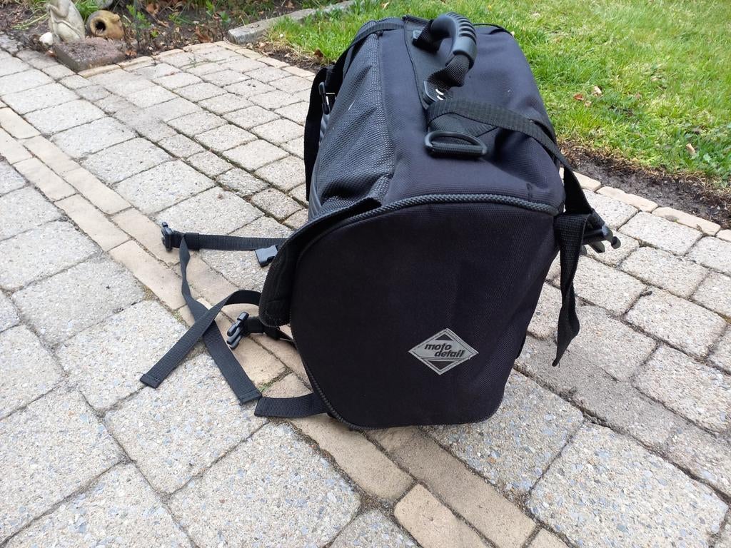 Bagagetas voor achter op de moto, Ophalen