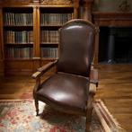 Antieke lederen armzetel met metalen wieltjes, Huis en Inrichting, Zetels | Zetels, Ophalen, Metaal, Antiek Klassiek