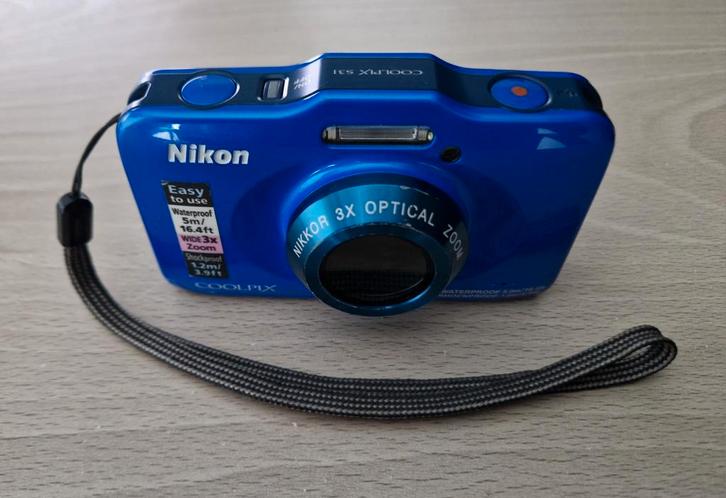 Nikon Coolpix 31 helderblauw - Waterbestendig, Audio, Tv en Foto, Fotocamera's Digitaal, Zo goed als nieuw, Compact, Nikon, Minder dan 4 keer