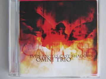 CD OMNI TRIO "EVEN ANGELS CAST SHADOWS" (Drum 'n' Bass) beschikbaar voor biedingen