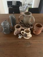 Potten van olen, Ophalen