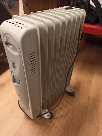 Radiateur a bain d'huile  2000w disponible aux enchères