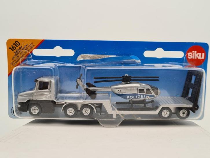 Vrachtwagen dieplader met helikopter - Siku 1/87, Hobby en Vrije tijd, Modelauto's | 1:87, Zo goed als nieuw, Bus of Vrachtwagen