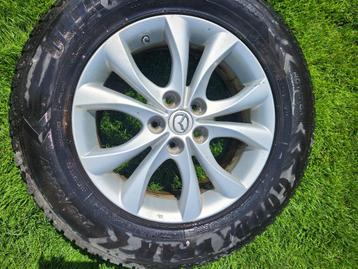 17” Mazda CX-7 Velgen + Banden Dunlop en Goodyear M+S 235/65 beschikbaar voor biedingen
