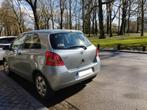 Toyota Yaris — Benzine — 91.000 km — 2e eigenaar — Nikkel, Auto's, Toyota, Voorwielaandrijving, Stof, Zwart, Particulier