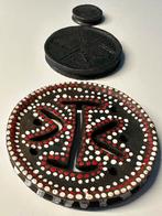 Mursi lip en/of oor platen, Ophalen