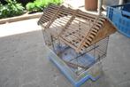 oude vogelkooi met rieten dak, Ophalen