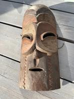 Authentiek Afrikaans masker, Ophalen