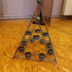 Ijzeren piramide voor theelichtjes, Ophalen