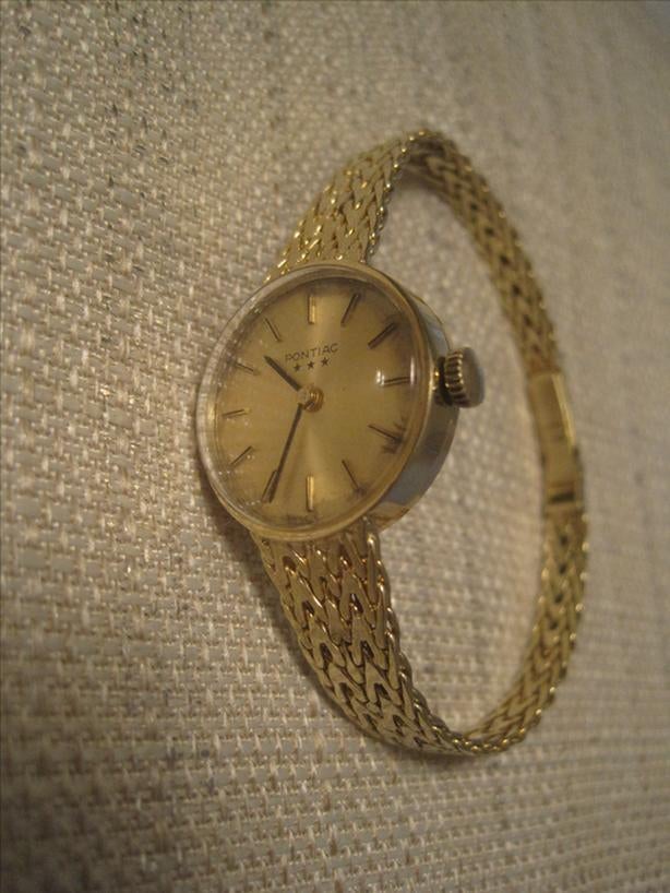 Montre Pontiac dorée (usée), Enlèvement ou Envoi, Or, Montre-bracelet, Autres marques